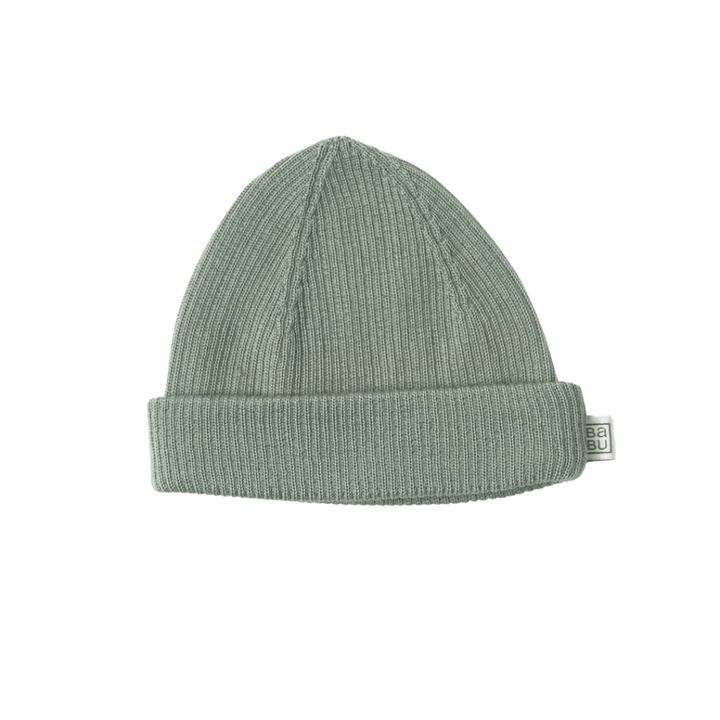 A light gray Babu Merino Rib Hat from Babu with a folded cuff featuring a small white tag.