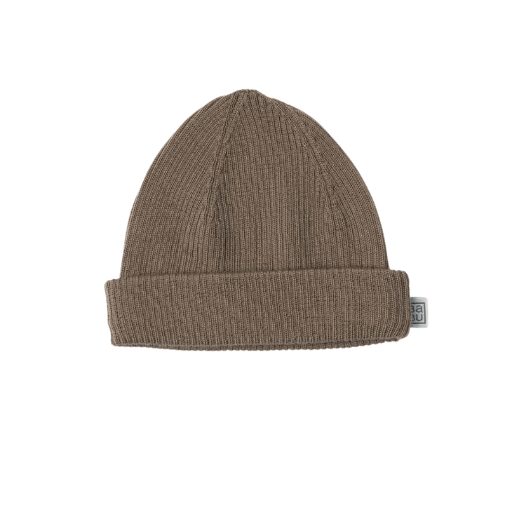 A brown Babu Merino Rib Hat by Babu with a folded brim and a small tag on the side.