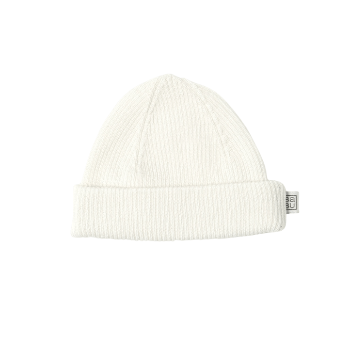 A white knit **Babu Merino Rib Hat** by **Babu** with a fold-up brim and a small tag on the side.