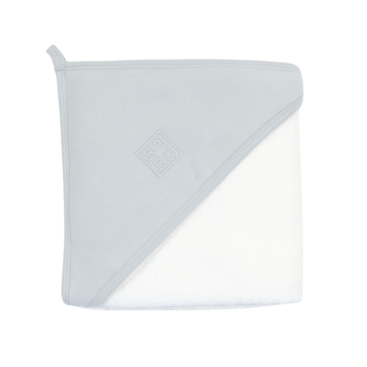 A folded light grey and white Babu Printed Organic Hooded Baby Towel made from 100% GOTS-certified cotton, featuring a loop on one corner and the letters "Ba" stitched into the grey fabric.