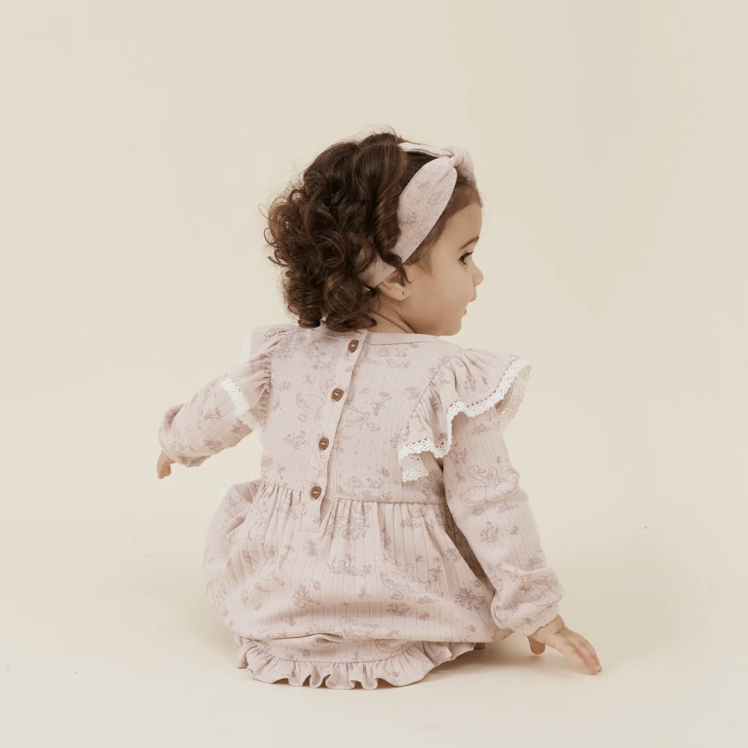 Back-Of-Aster-And-Oak-Organic-Duck-Family-Ruffle-Dress-On-Model-Naked-Baby-Eco-Boutique