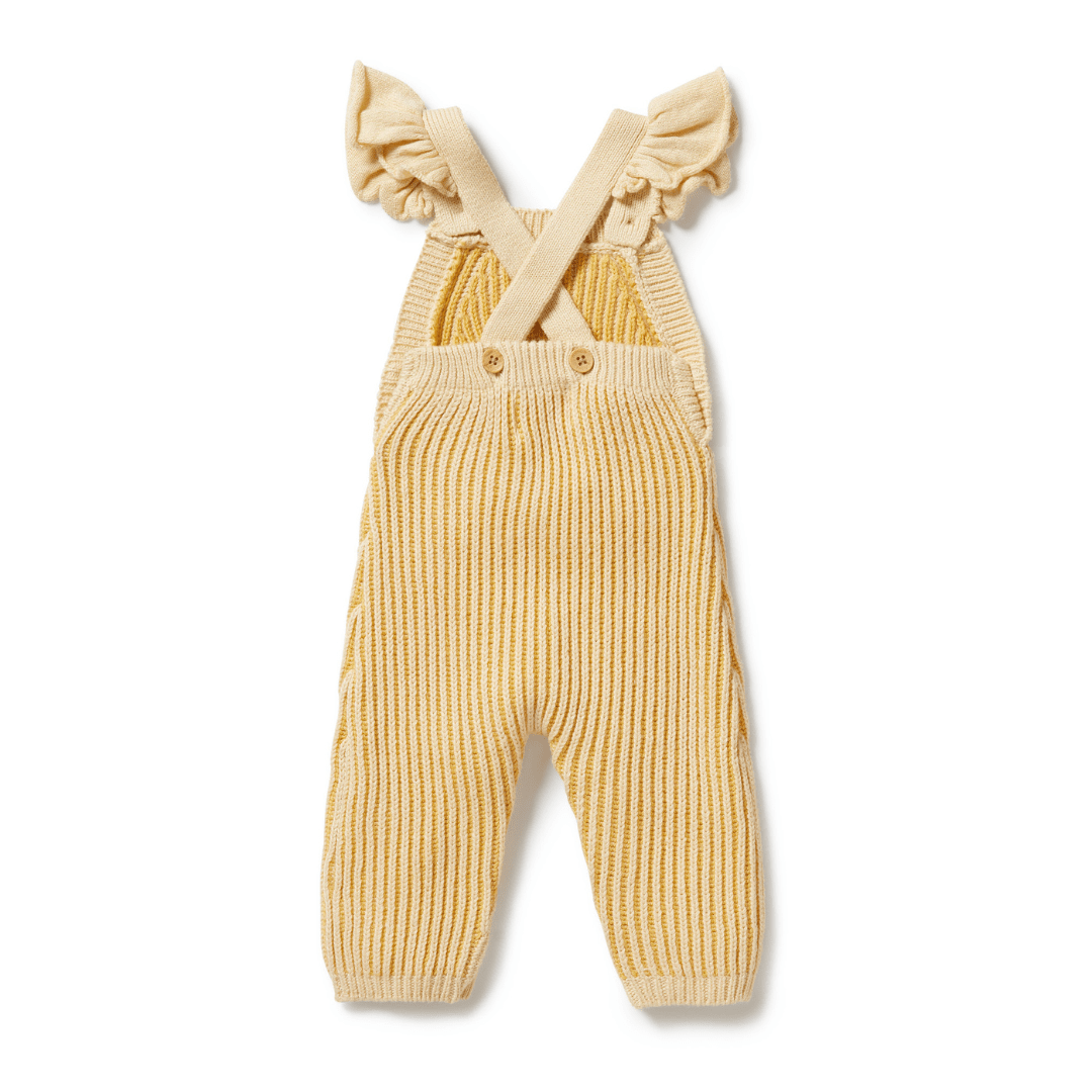 The Wilson & Frenchy Knitted Ruffle Overalls - LUCKY LASTS - DIJON ONLY feature charming ruffled shoulder straps and secure button fastenings, making them the perfect baby overalls for your little one.