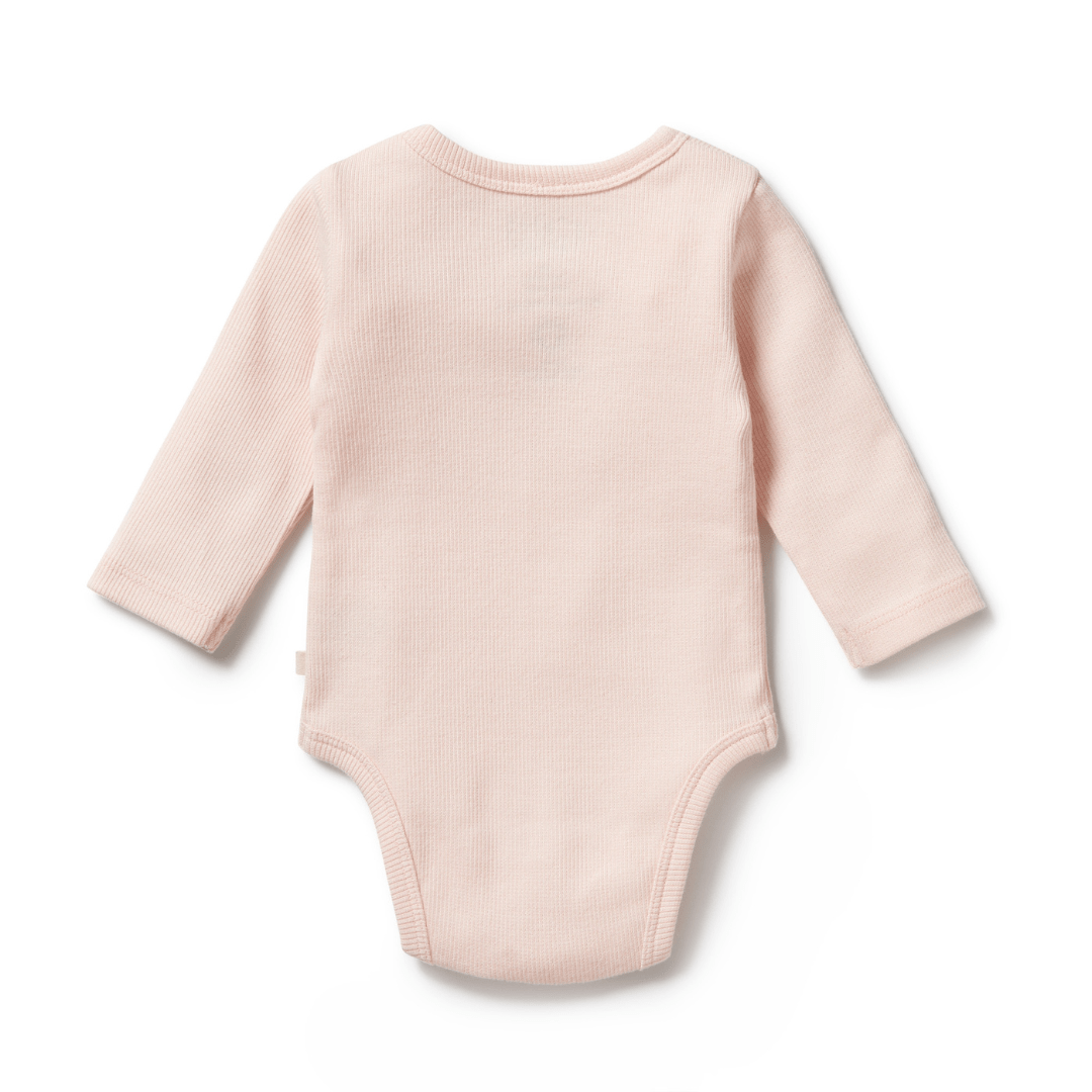 A light pink, long-sleeve Wilson & Frenchy Organic Rib Long Sleeved Onesie, featuring a round neckline, displayed flat with the back facing up—perfect for any baby wardrobe. Crafted from organic cotton rib by the renowned brand Wilson & Frenchy.