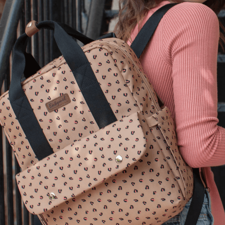 Close-Up-of-Babymel-Georgi-Eco-Convertible-Nappy-Backpack-Caramel-Leopard-on-Mums-Shoulder-Naked-Baby-Eco-Boutique