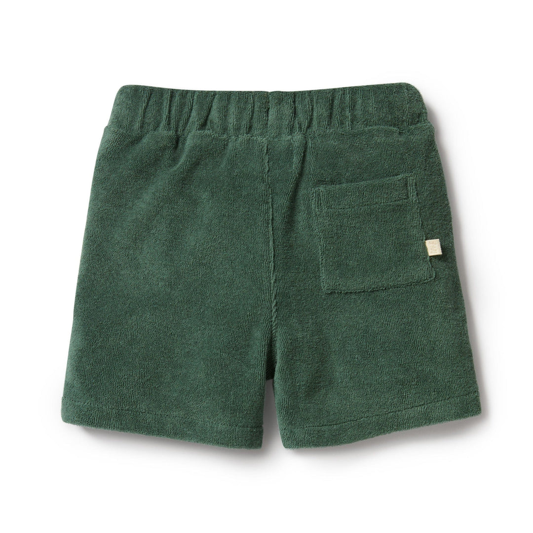 These Wilson & Frenchy Organic Terry Shorts - LUCKY LASTS - 0-3 MONTHS ONLY, made from GOTS-certified organic cotton, feature a green hue perfect for a summer staple. They come with an elastic waistband and a single back pocket for convenience.