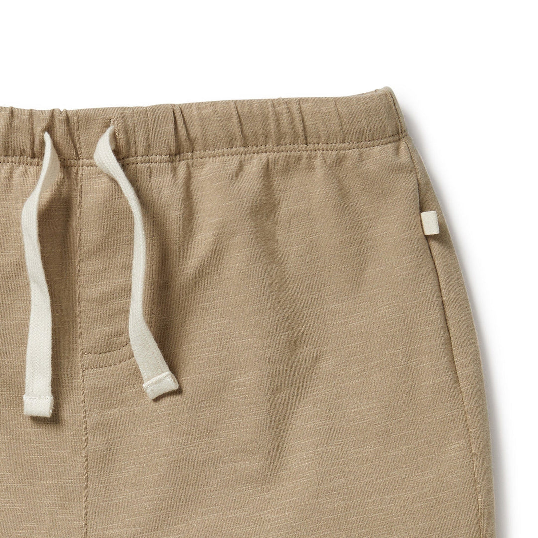 A tan Wilson & Frenchy Organic Tie Front Kids Shorts with white drawstrings - LUCKY LASTS - 4 & 5 YEARS ONLY.