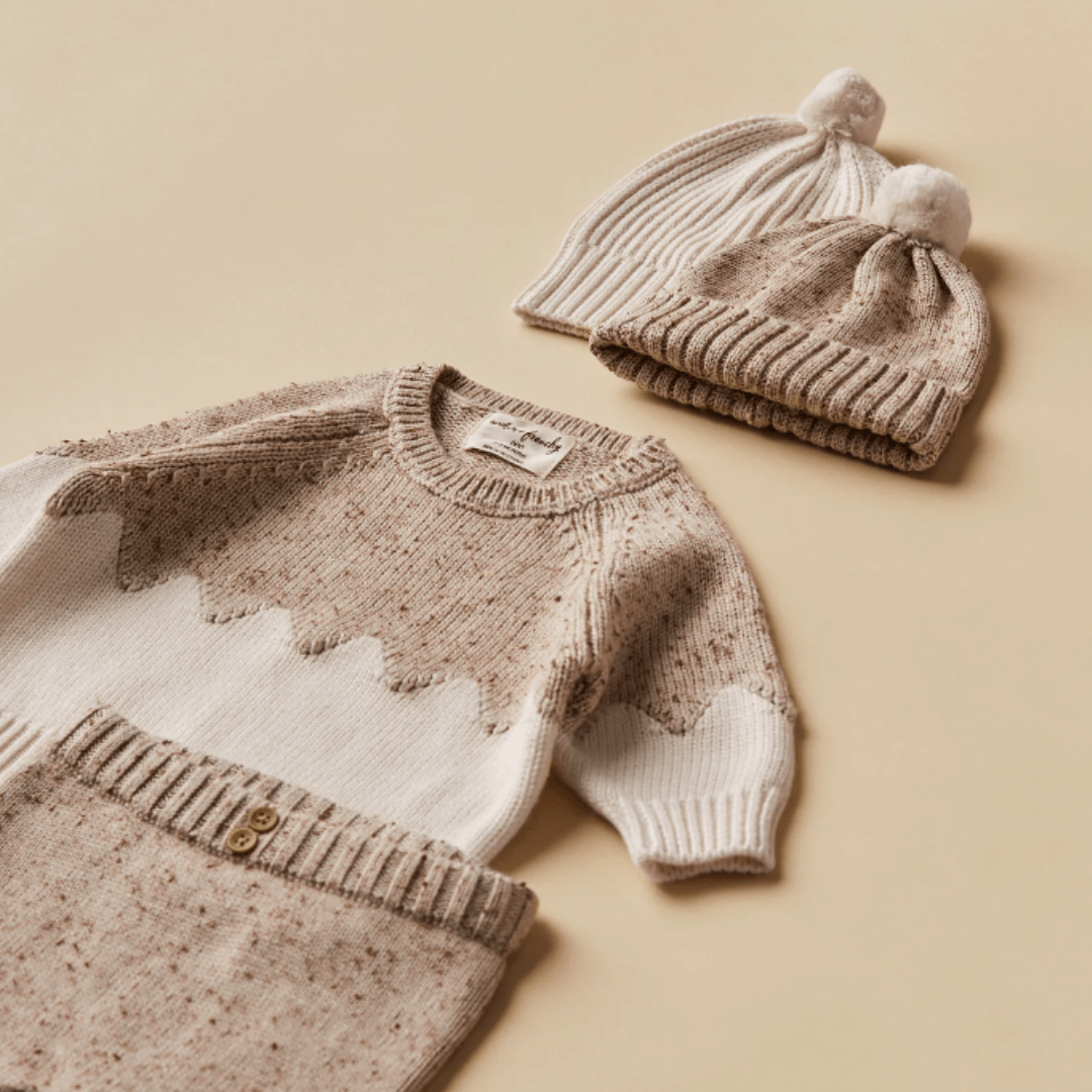 Wilson & Frenchy Fleck Knitted Jacquard Jumper and knitted hat on a beige background.