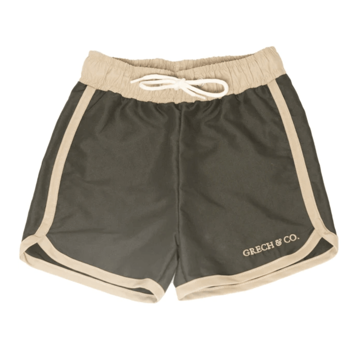 A Grech & Co. UPF 40+ recycled swim trunks with the word "green co" on it.