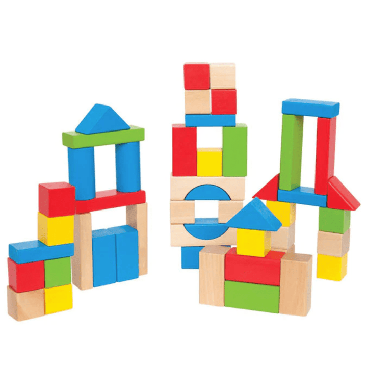The Hape Build Up and Away Blocks by Hape, coated in child-safe paints, are arranged in various structures, including towers and houses, on a white background, fostering imaginative play.