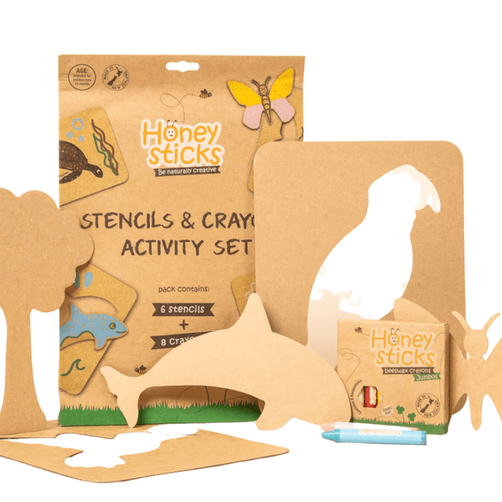 The Honeysticks Jumbo Stencil & Crayon Activity Set includes six Jumbo Stencils and eight pure beeswax crayons with animal shapes for creative play. This eco-friendly activity set features packaging adorned with a butterfly and a tree.