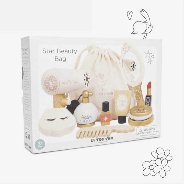 A children's pretend play makeup set with wooden accessories, packaged in a Le Toy Van Star Beauty Bag - LUCKY LAST.