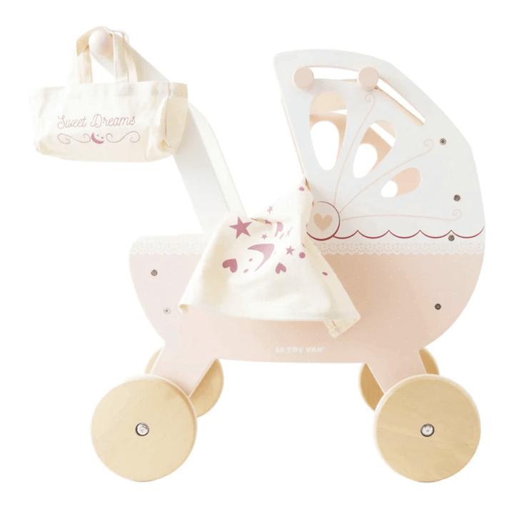 A Le Toy Van Sweet Dreams Doll Pram with a pink bag.