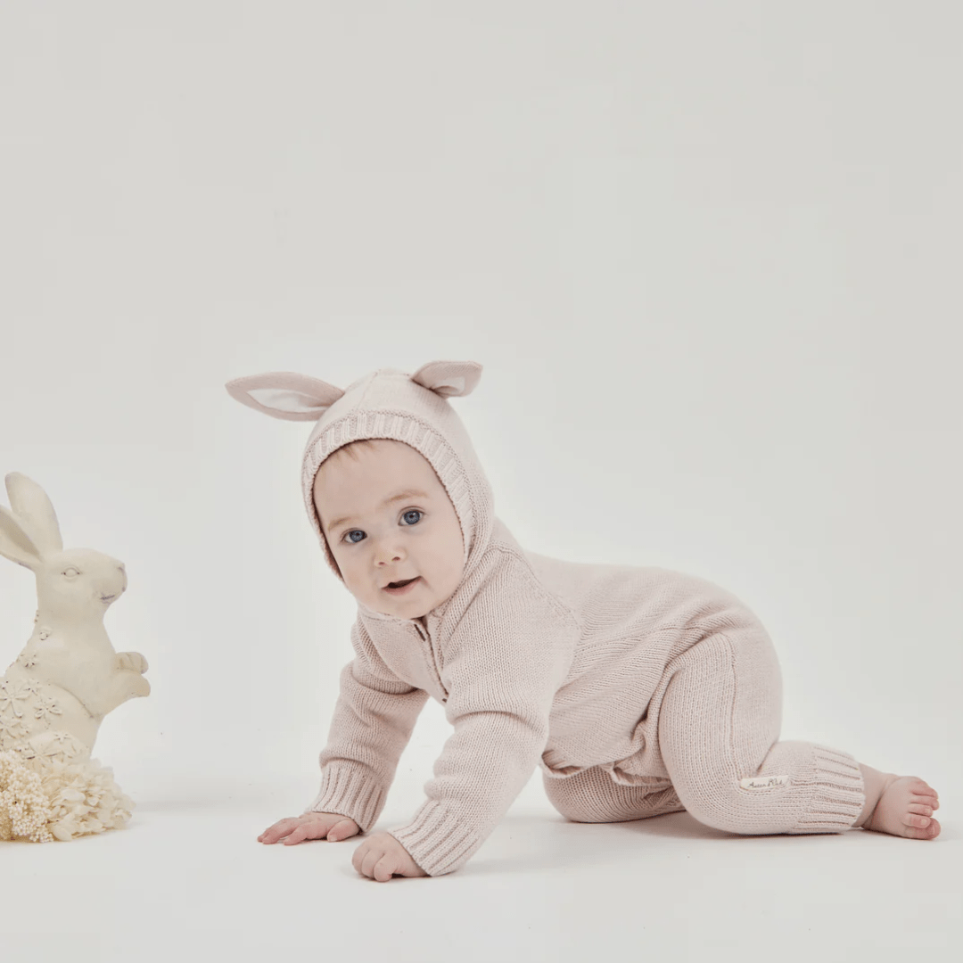 Little-Baby-Crawling-With-Toy-Bunny-Wearing-Aster-And-Oak-Organic-Bunny-Knit-Romper-Mauve-Naked-Baby-Eco-Boutique