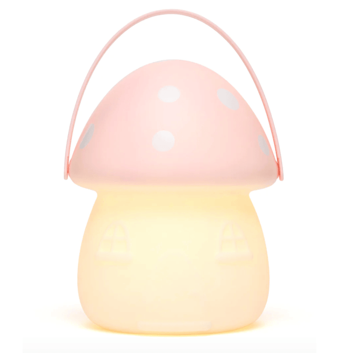 A Little Belle Nightlights Fairy House Carry Lantern with polka dots that provides nighttime illumination.