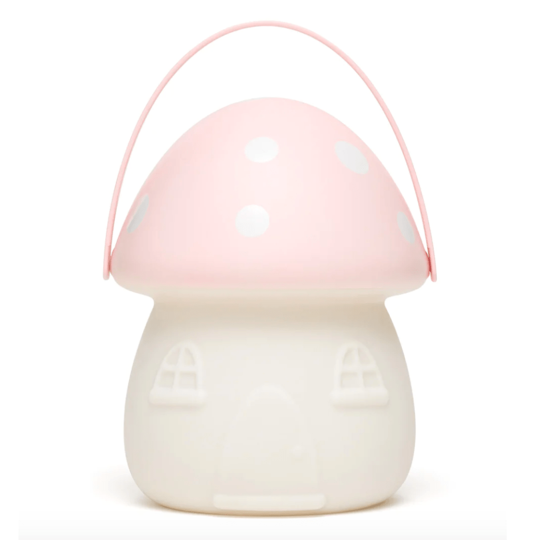 A Little Belle Nightlights Fairy House Carry Lantern with polka dots on it, providing nighttime illumination as a magical nightlight.