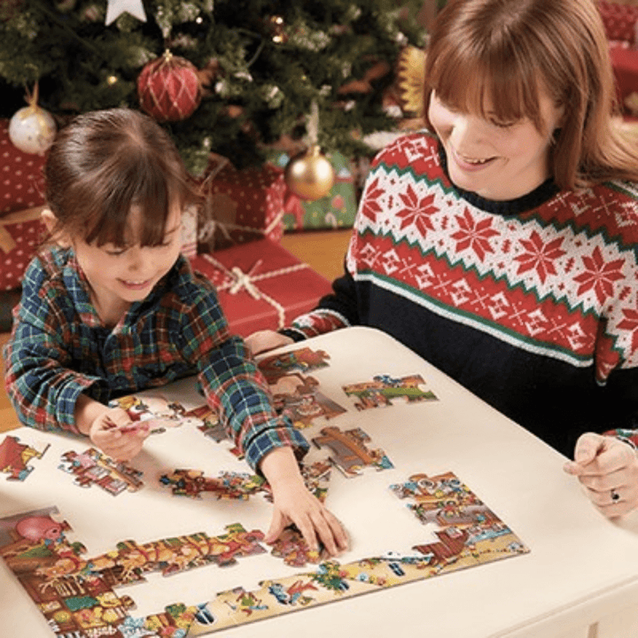 Little-Boy-Completing-Puzzle-In-Orchard-Toys-Christmas-Eve-Box-Earth-Baby-Eco-Boutique