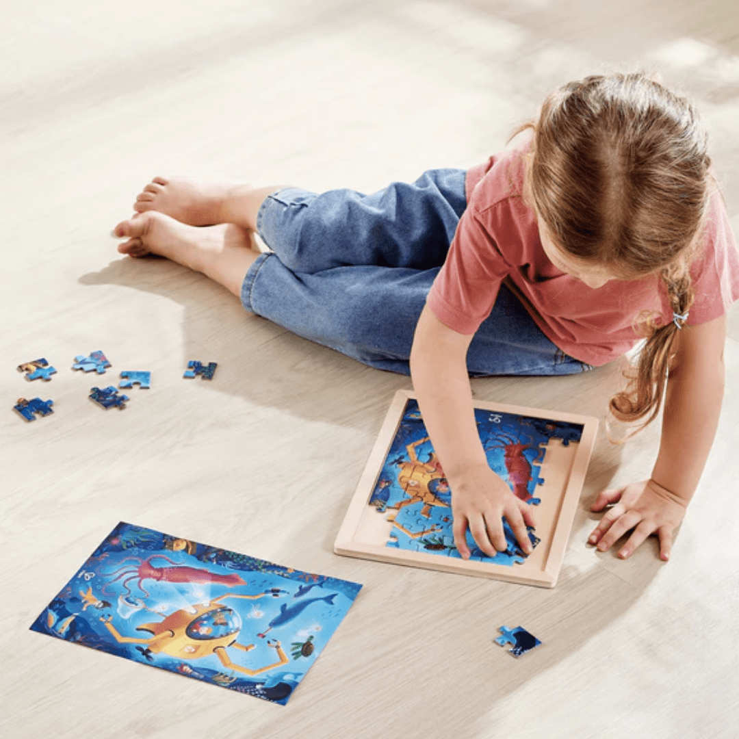 Little-Boy-Doing-Hape-48-Piece-Double-Sided-Colour-Puzzle-Ocean-Friends-Naked-Baby-Eco-Boutique