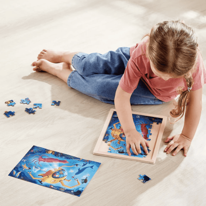 Little-Boy-Doing-Hape-48-Piece-Double-Sided-Colour-Puzzle-Ocean-Friends-Naked-Baby-Eco-Boutique