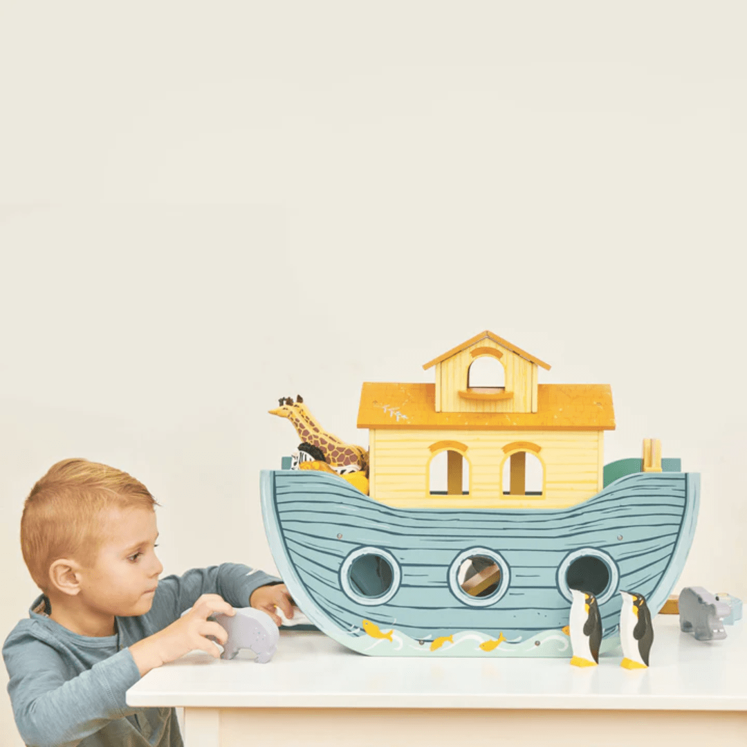 Little-Boy-Playing-With-Aminal-Toy-On-Le-Toy-Van-Great-Noahs-Ark-Naked-Baby-Eco-Boutique