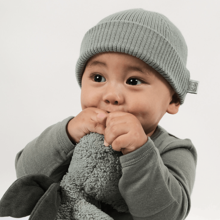 Little-Boy-Wearing-Babu-Merino-Rib-Hat-Babu-Sage-Naked-Baby-Eco-Boutique