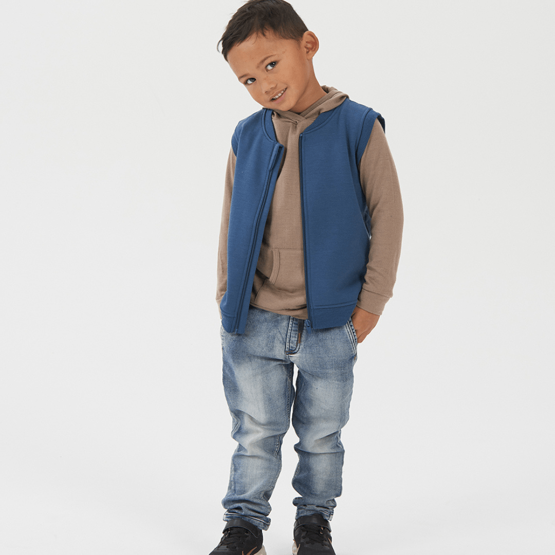 Little-Boy-in-Jeans-and-Hoodie-Wearing-Babu-Merino-Fleece-Vest-Naked-Baby-Eco-Boutique