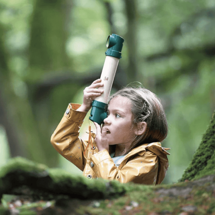 Little-Girl-Using-Hape-Hide-And-Seek-Periscope-Naked-Baby-Eco-Boutique