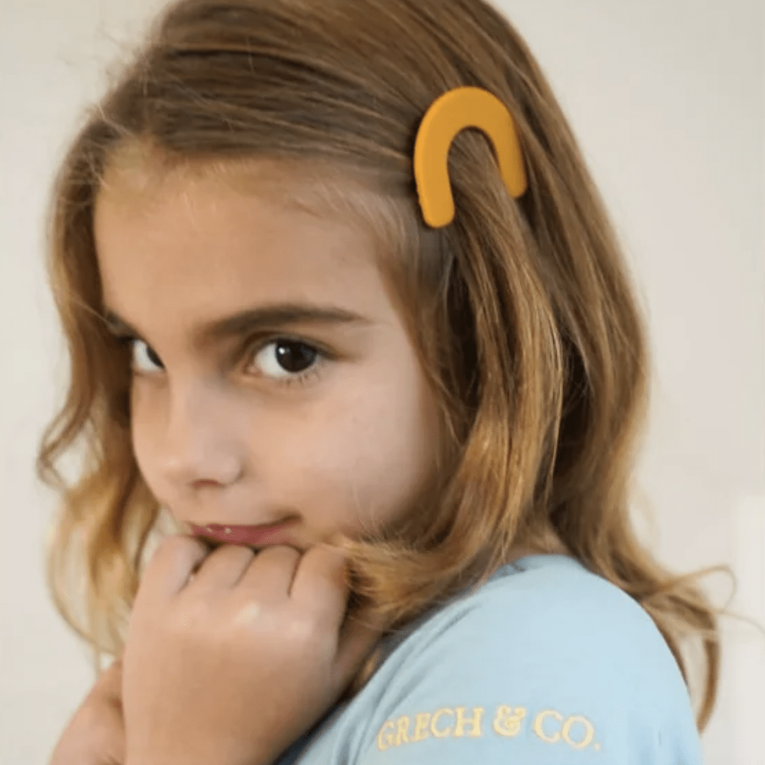 Little-Girl-Wearing-Grech-And-Co-Arch-Hair-Clip-Tuscany-Naked-Baby-Eco-Boutique