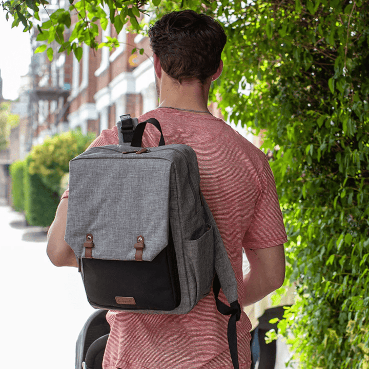 Man-Walking-Wearing-Babymel-George-Eco-Nappy-Backpack-Naked-Baby-Eco-Boutique