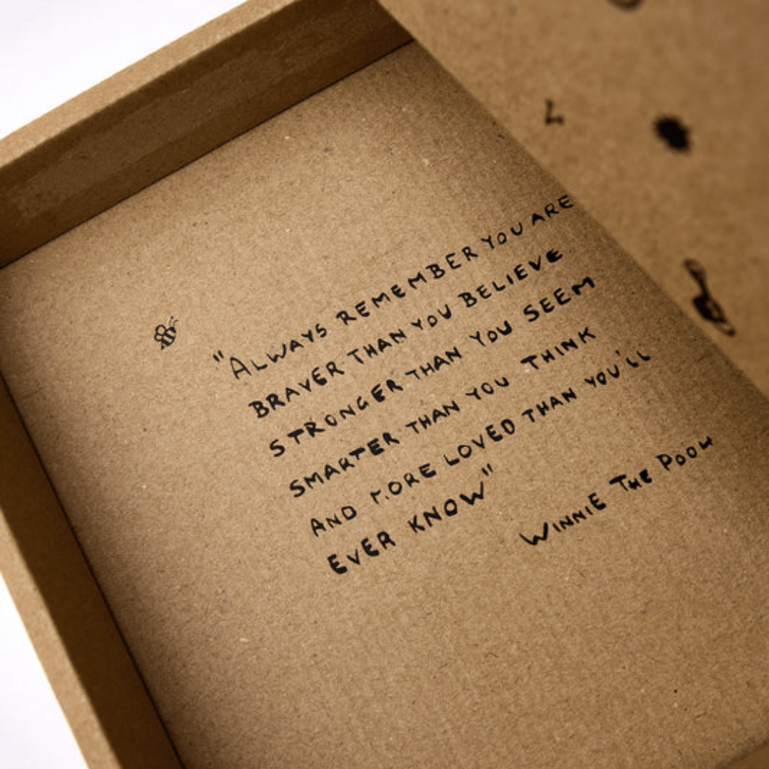 Quote-On-Lid-Of-Saga-Copenhagen-Cuddle-Up-Gift-Box-Naked-Baby-Eco-Boutique