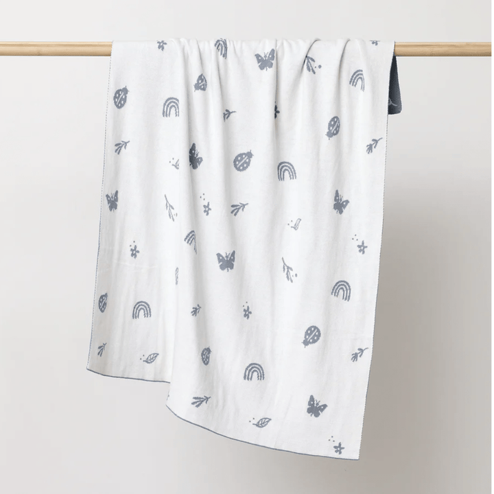 Reverse-Side-Of-Over-the-Dandelions-Organic-Cotton-Print-Blanket-Echanted-Garden-Sky-Naked-Baby-Eco-Boutique
