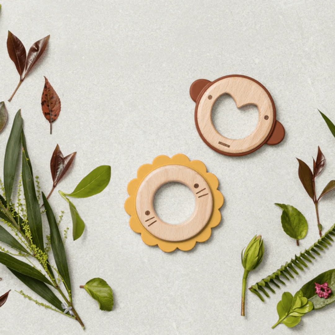 Styled-Flatlay-Of-Over-The-Dandelions-Wood-And-Silicone-Teether-Leo-The-Lion-Naked-Baby-Eco-Boutique