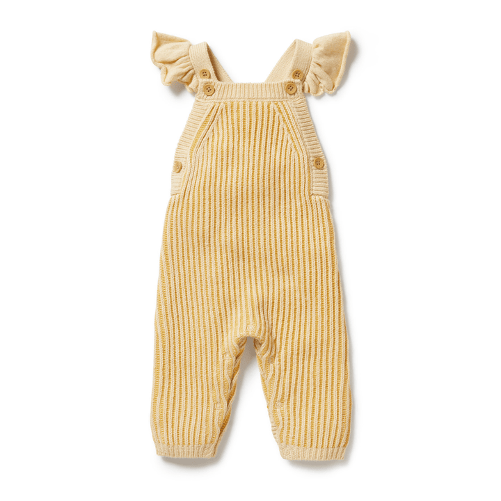 The Wilson & Frenchy Knitted Ruffle Overalls in Dijon feature a vibrant yellow hue with vertical stripes and charming ruffled shoulder straps.