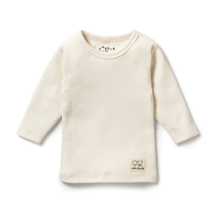 A Wilson & Frenchy Organic Rib Long Sleeved Top from the "Lucky Lasts" collection, available in sizes 6-12 months and 12-18 months, in off-white, featuring a small embroidered design near the bottom hem and crafted from soft organic cotton with a ribbed texture.