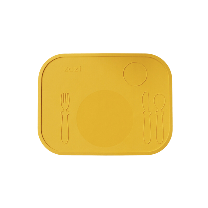 The Zazi Clever Mat by Zazi is a yellow silicone placemat with embossed shapes of a fork, spoon, knife, a large circle for a plate, and a small circle for a cup. Made from food-grade silicone, it utilizes suction technology to ensure the mat stays securely in place.