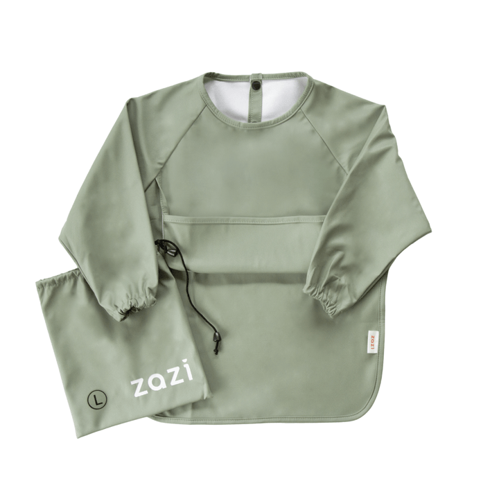 The Zazi Recycled Full-Sleeved Bib in sage green features long sleeves, waterproof fabric, and stain resistance. It has a front pocket, a button closure at the back, and elastic cuffs. The bib is accompanied by a matching drawstring pouch with the brand name "Zazi" printed on it.