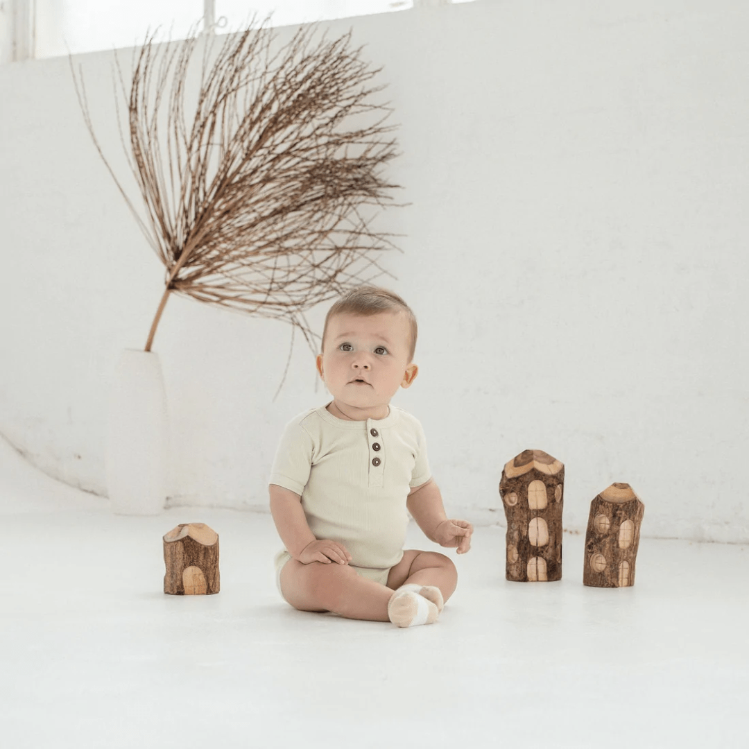 Aster-And-Oak-Organic-Cotton-Rib-Henley-Onesie-Dewkist-On-Baby-Naked-Baby-Eco-Boutique