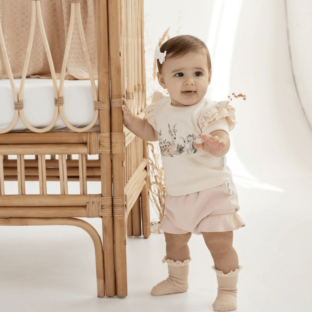 Aster-And-Oak-Organic-Rib-Ruffle-Bloomers-Peach-Rib-On-Baby-Naked-Baby-Eco-Boutique