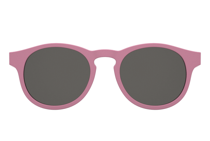 Babiators Keyhole Baby & Kids Sunglasses (Multiple Variants) with flexible rubber frames and black lenses, providing 100% UVA and UVB protection against a plain background.
