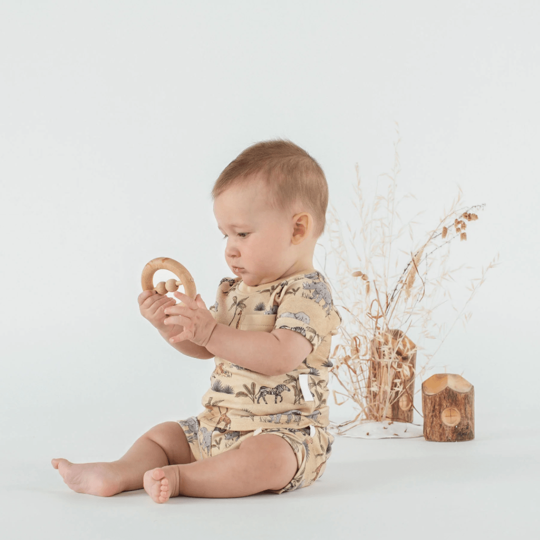 Baby-Sitting-Wearing-Aster-and-Oak-Organic-Cotton-Safari-Pocket-Shorts-Naked-Baby-Eco-Boutique