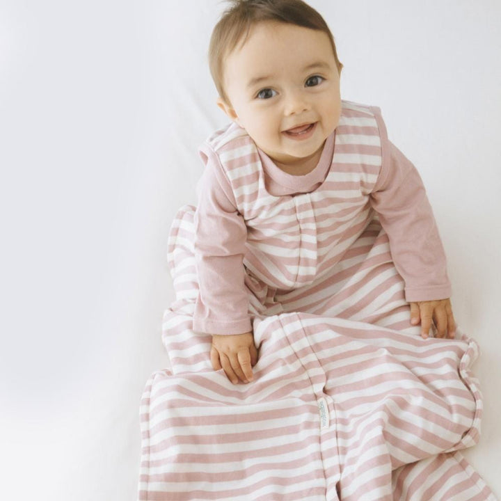 Baby-Sitting-Wearing-Woolbabe-Merino-Organic-Cotton-3-Seasons-Sleeping-Bag-Dusk-Naked-Baby