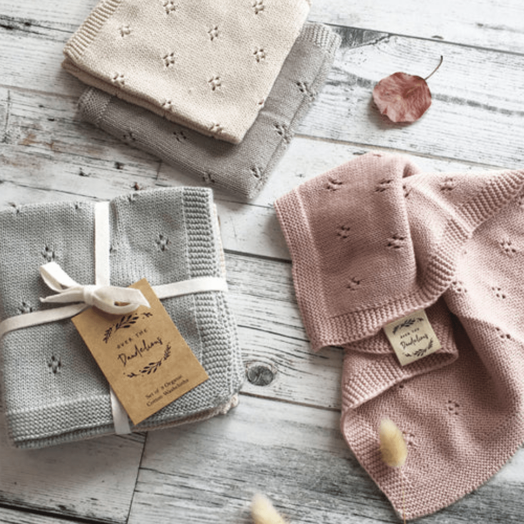 Flatlay-Over-The-Dandelions-Knitted-Organic-Cotton-Washcloths-Set-Of-3-Sea-Naked-Baby-Eco-Boutique