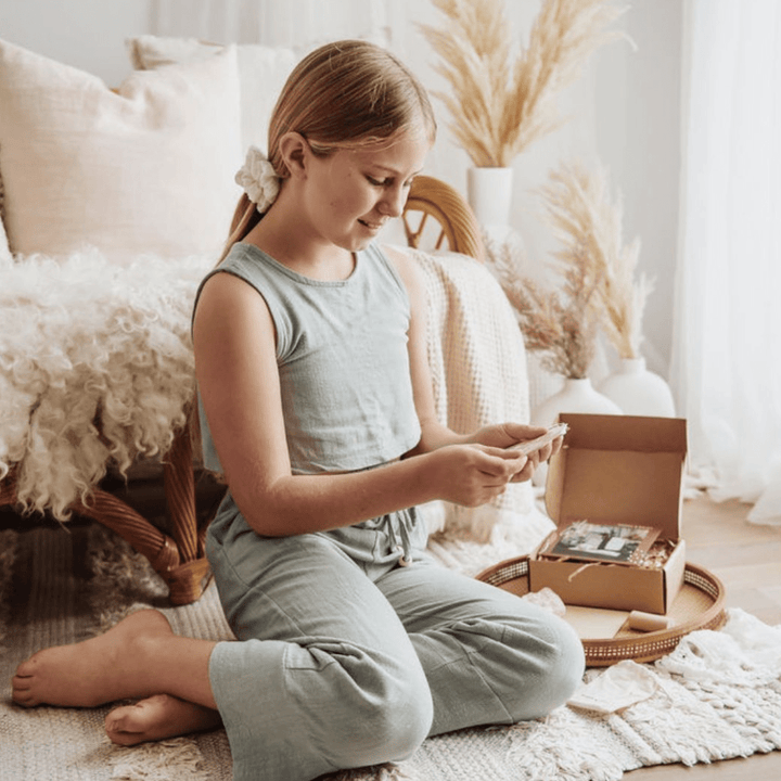 Girl-Reading-Affirmation-Poppy-And-Daisy-Mindful-Moments-Pink-Naked-Baby-Eco-Boutique