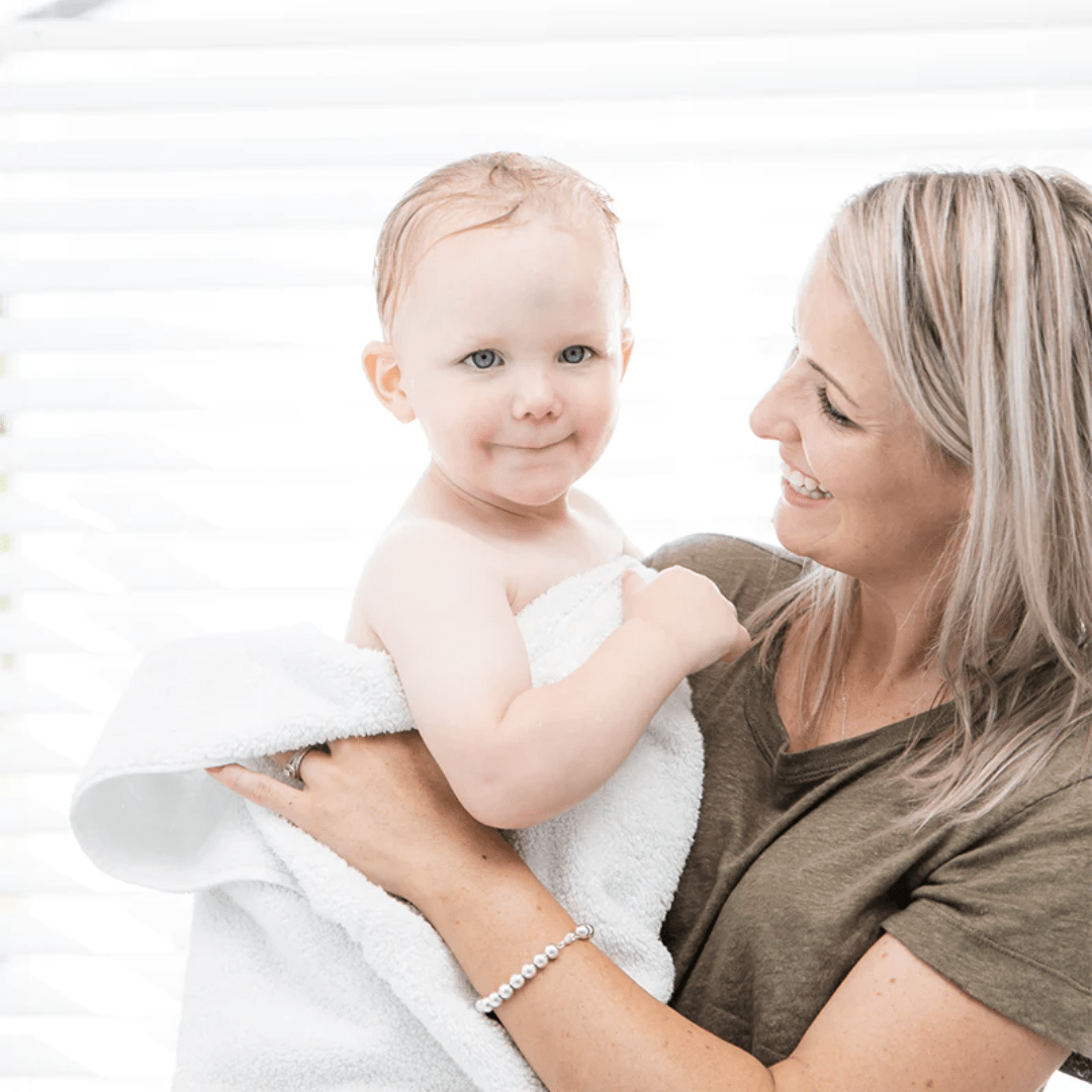 Haakaa-Oatmeal-Bath-Milk-In-Towel-After-Bath-Naked-Baby-Eco-Boutique