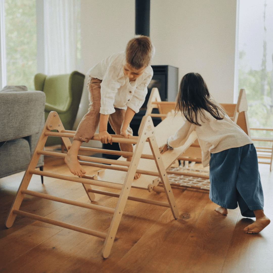 Two-Children-Playing-on-Kinderfeets-Pikler-Triangle-Medium-Naked-Baby-Eco-Boutique